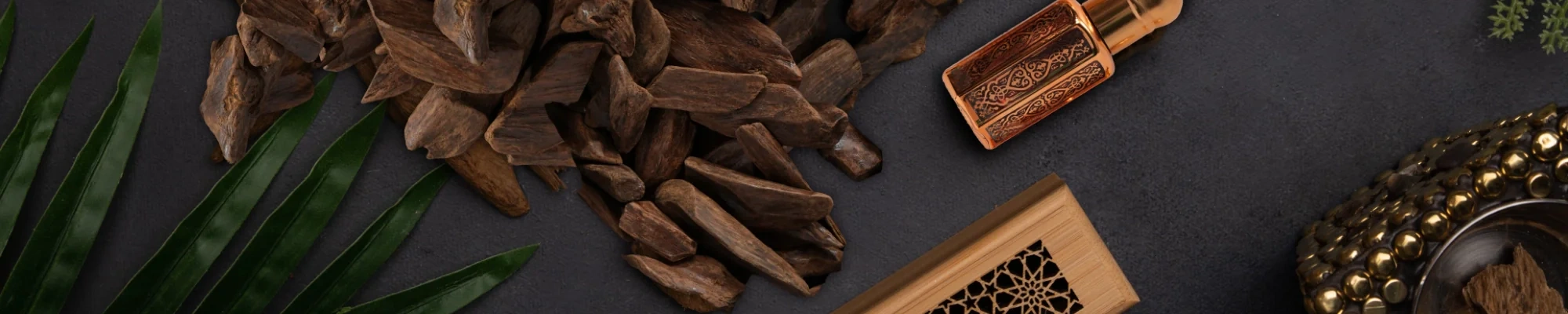 agarwood-bracelet-main-background Luxurious agarwood bracelet on natural agarwood tree background, showcasing handcrafted agarwood beads and prayer beads elegance.